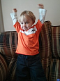 Young fan Rex who is almost two cheering the Swans on from home in Swansea