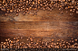 木板上的咖啡豆背景高清图片