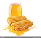 装满玻璃瓶的蜂蜜和流淌的蜂巢蜜高清图片