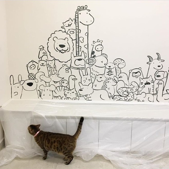 画在墙上的挤娃娃